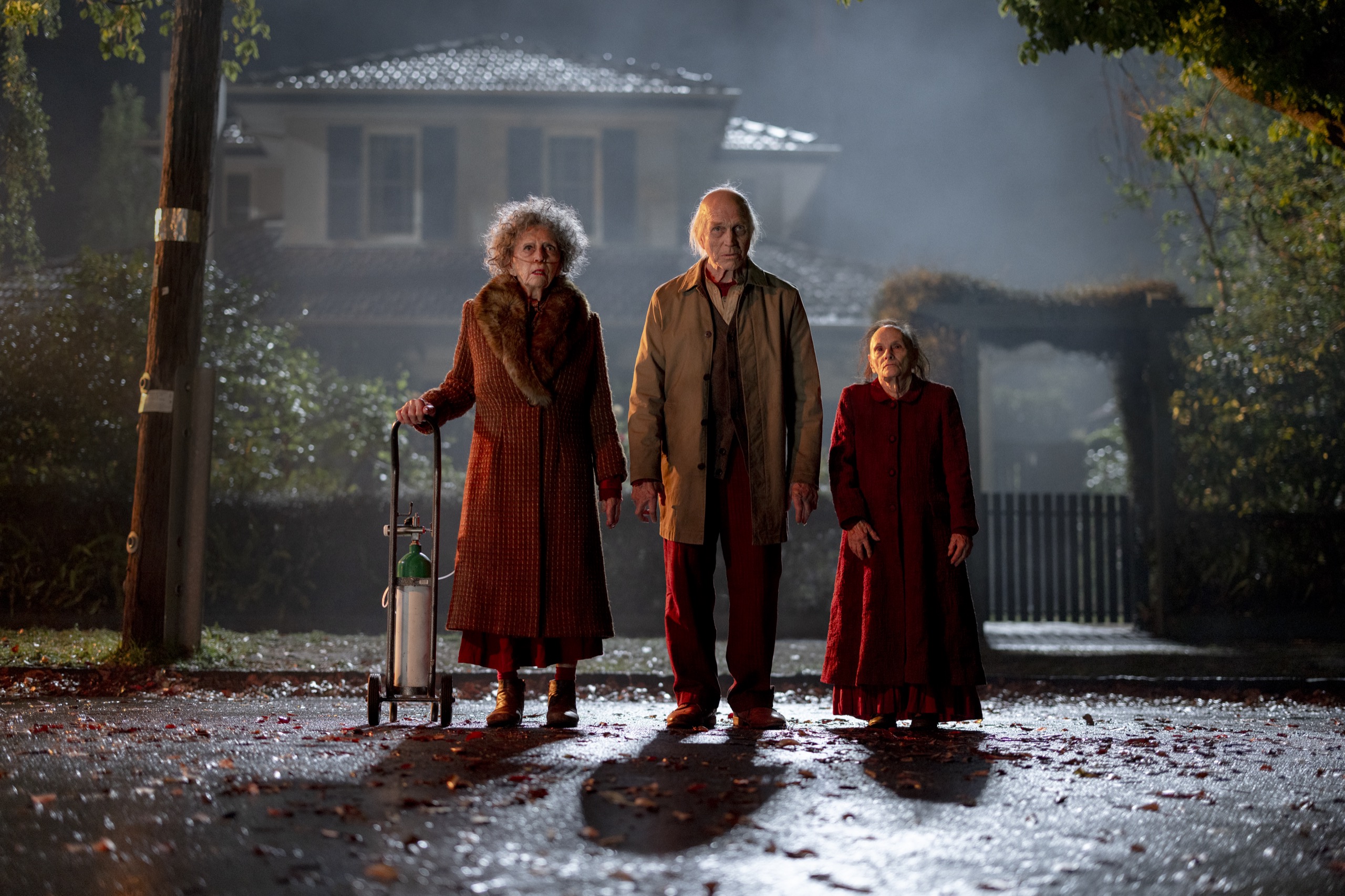 Elise Rainier (Lin Shaye) returns, flanked by allies.