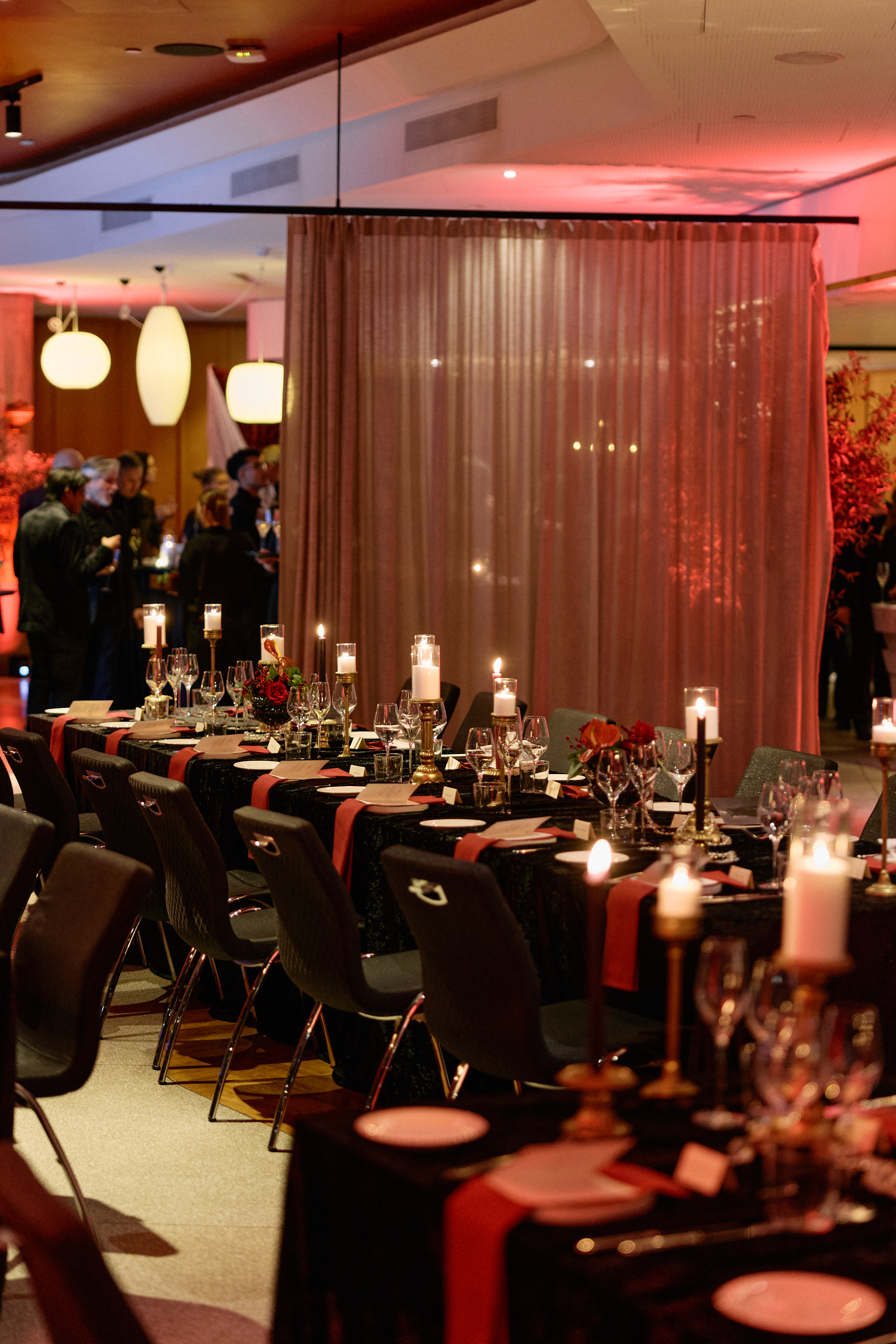 The two long communal tables that anchored the room, set for a royal funeral.