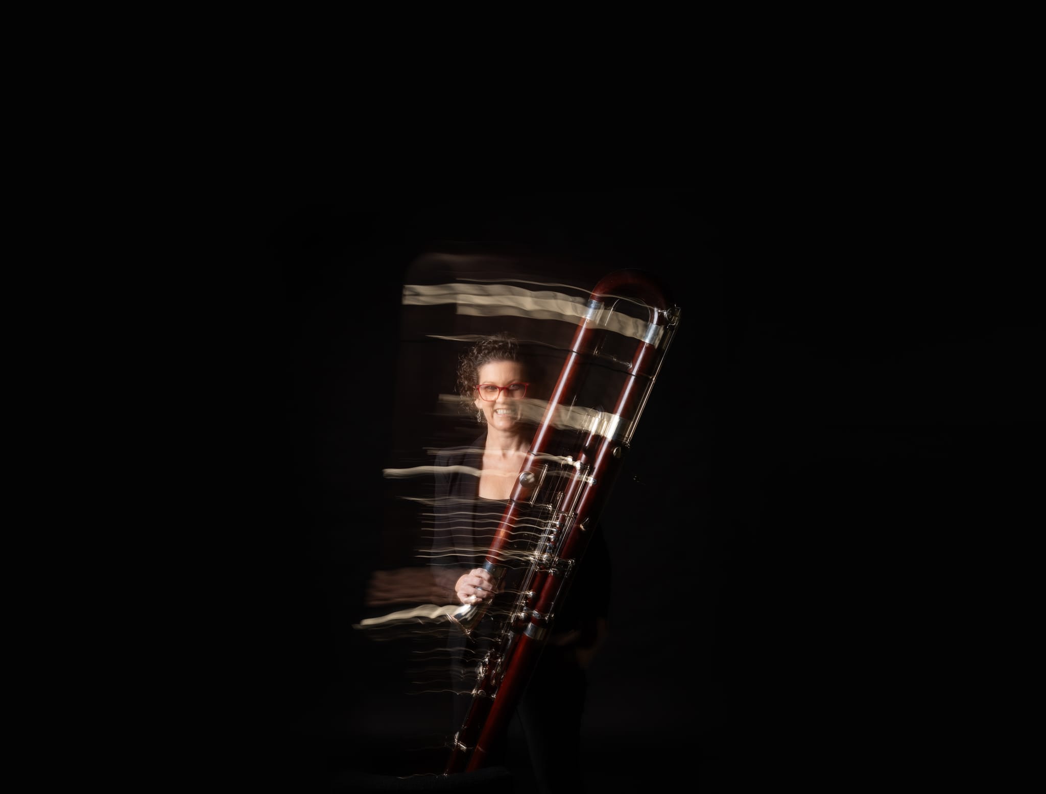 A QSO bassoonist, from the orchestra's 80th anniversary season campaign photography.