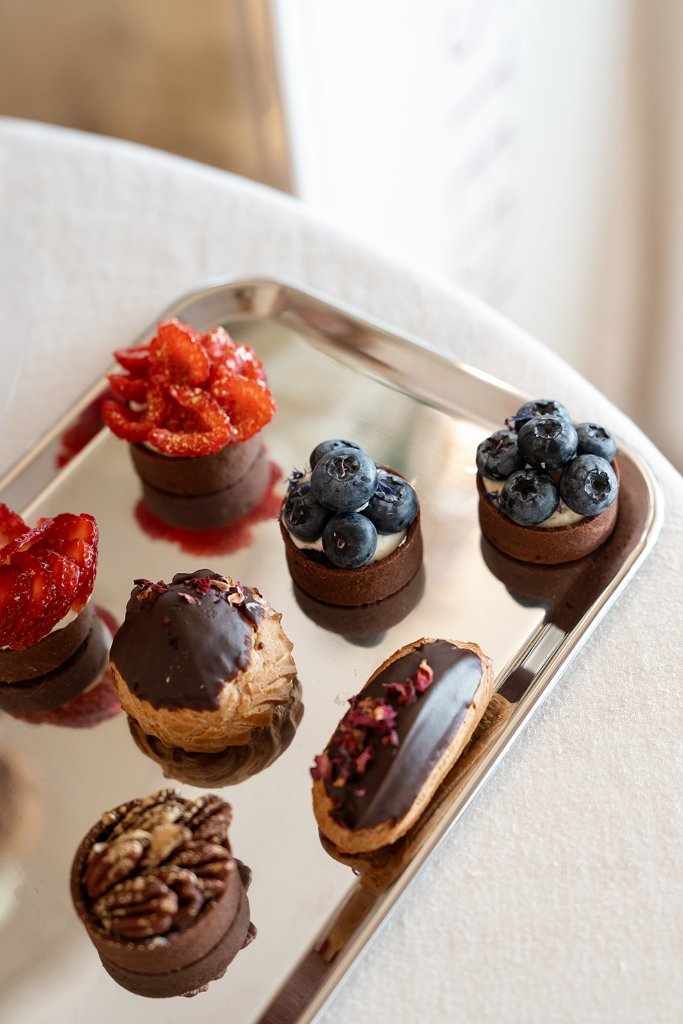 Eclair at the Bay pastry selection on a silver tray